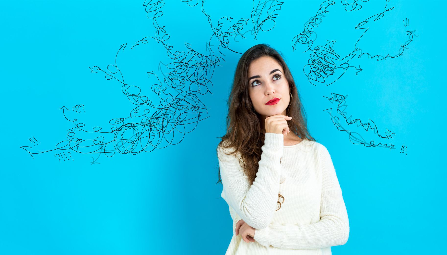 Young woman in a thoughtful pose
