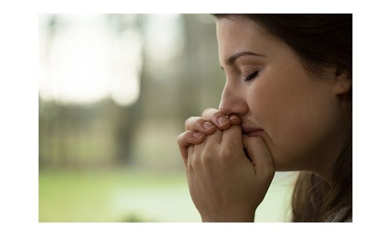 Depressed young woman crying