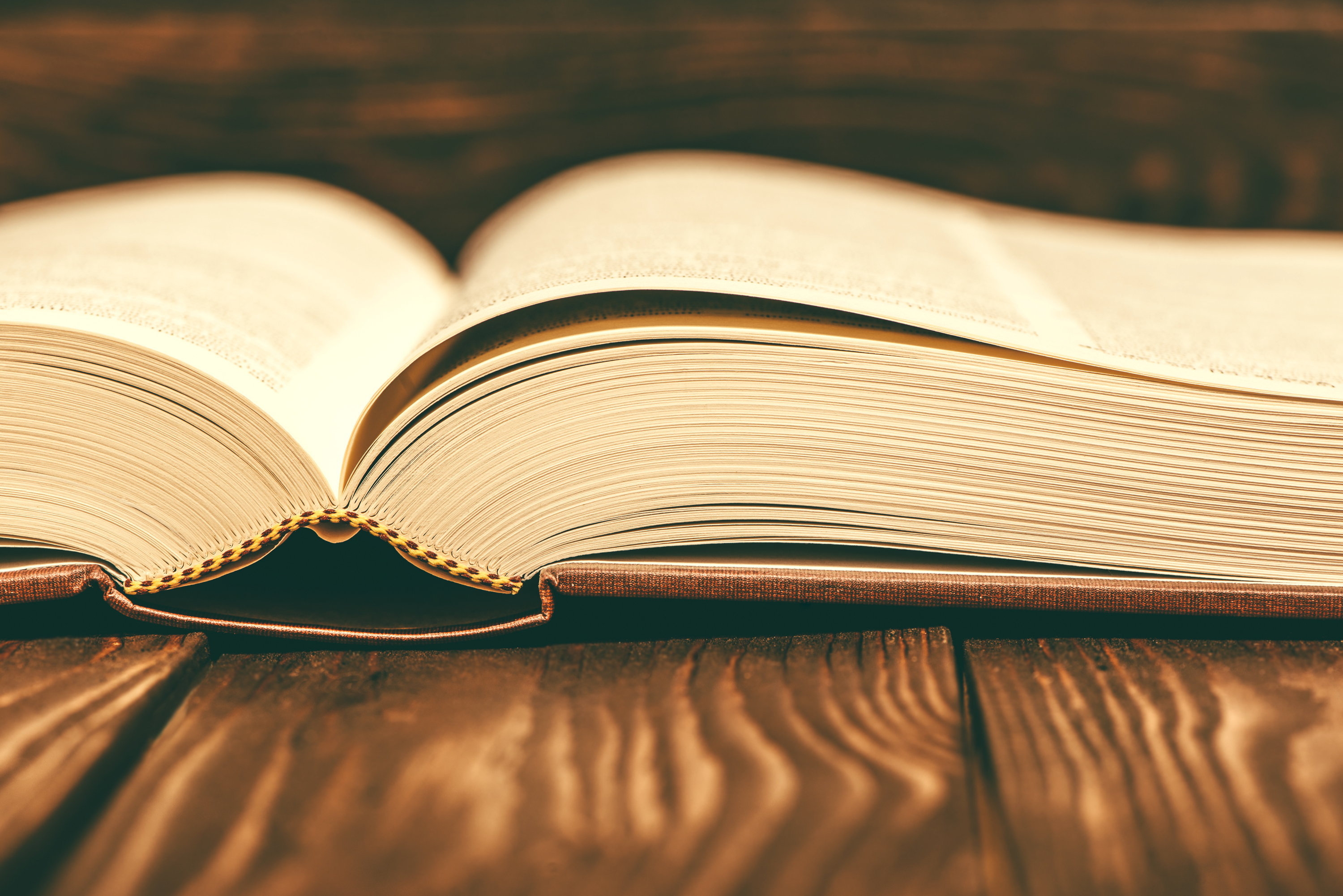 Vintage book on wooden background