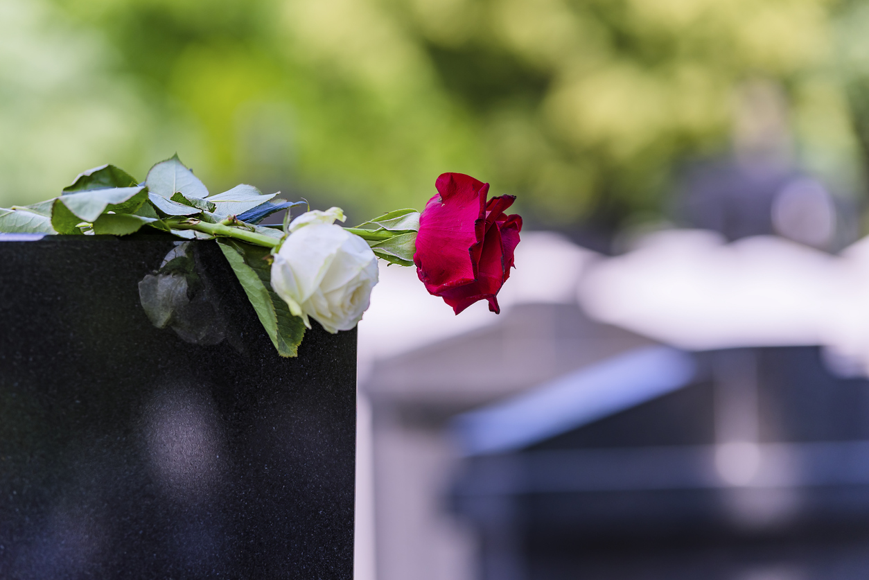 Flower On A Grave In A Cemetery