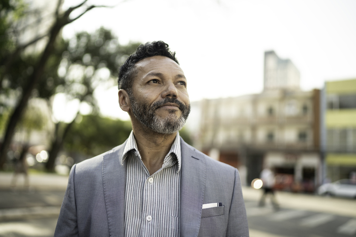 Businessman looking away on the street