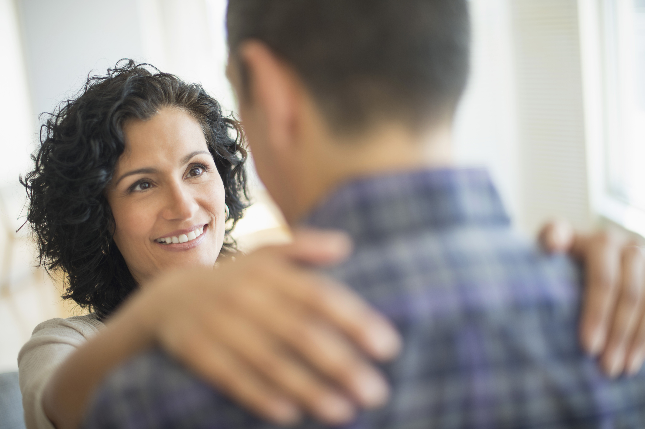 USA, New Jersey, Woman embracing man