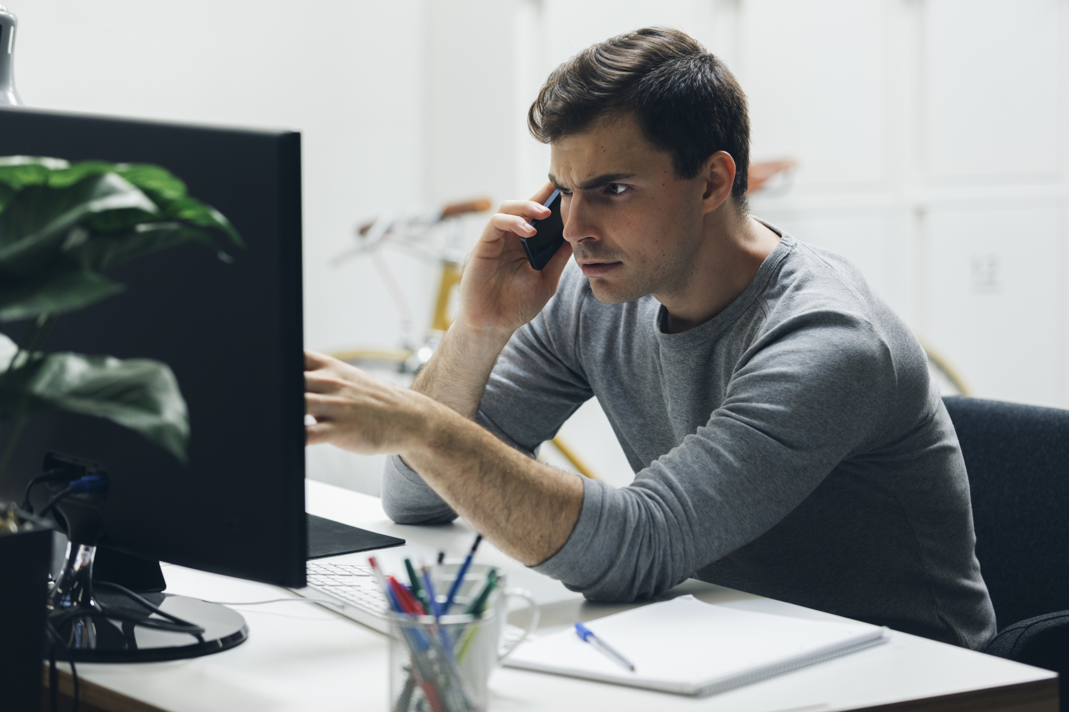 Worried businessman in office.