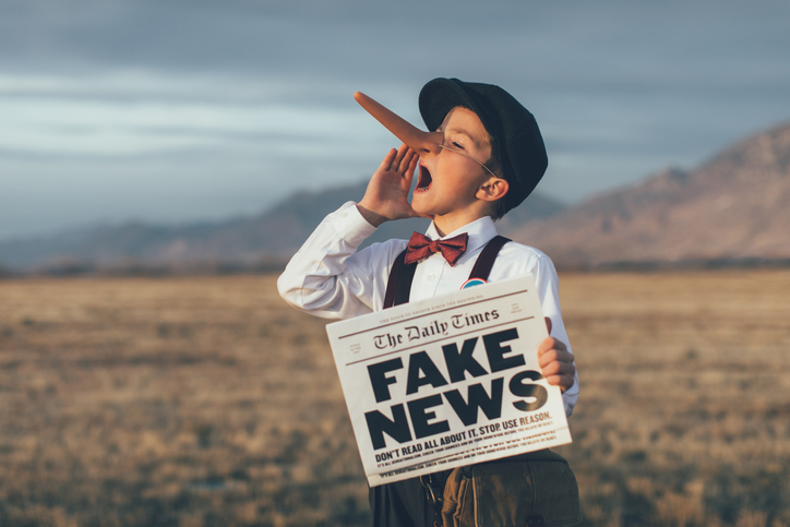 Old Fashioned Pinocchio News Boy Holding Fake Newspaper