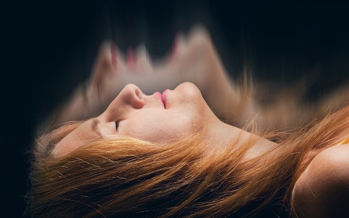 Sleeping Woman Having a Nightmare