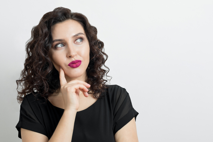 Young woman thinking