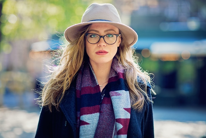 Portrait of beautiful young girl in the city
