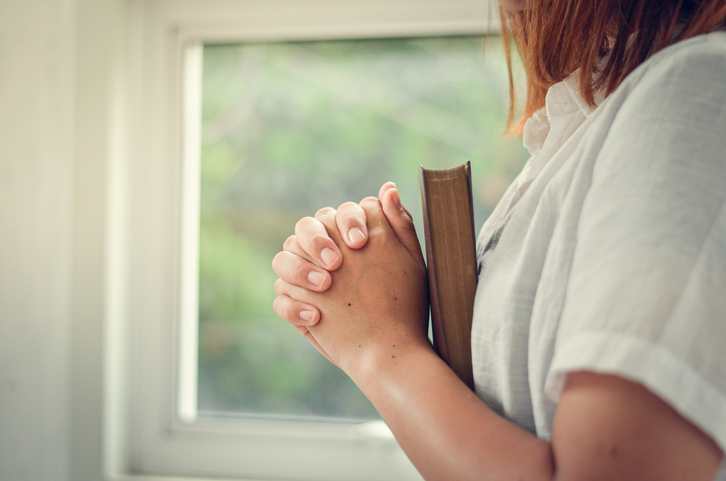 Girl praying to god Women pray for a blessing from God for a better life. And believe in a great Christian life crisis, pray to God