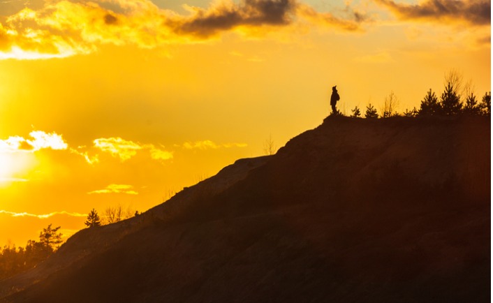 man-on-top-of-a-mountain-sunset-harmony-adventure-picture-id1216837966