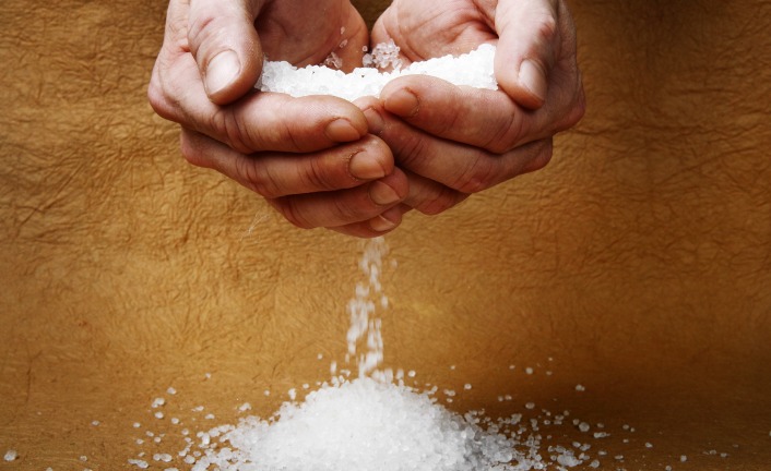 man-hands-holding-salt-picture-id174914126