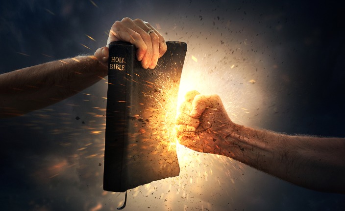 punching-the-bible-picture-id585072646