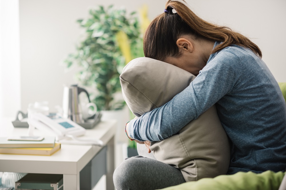 Unhappy,Lonely,Depressed,Woman,At,Home,,She,Is,Sitting,On