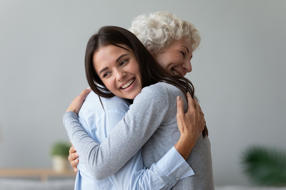 Happy,Young,Lady,Adult,Daughter,Granddaughter,Visiting,Embracing,Hugging,Old