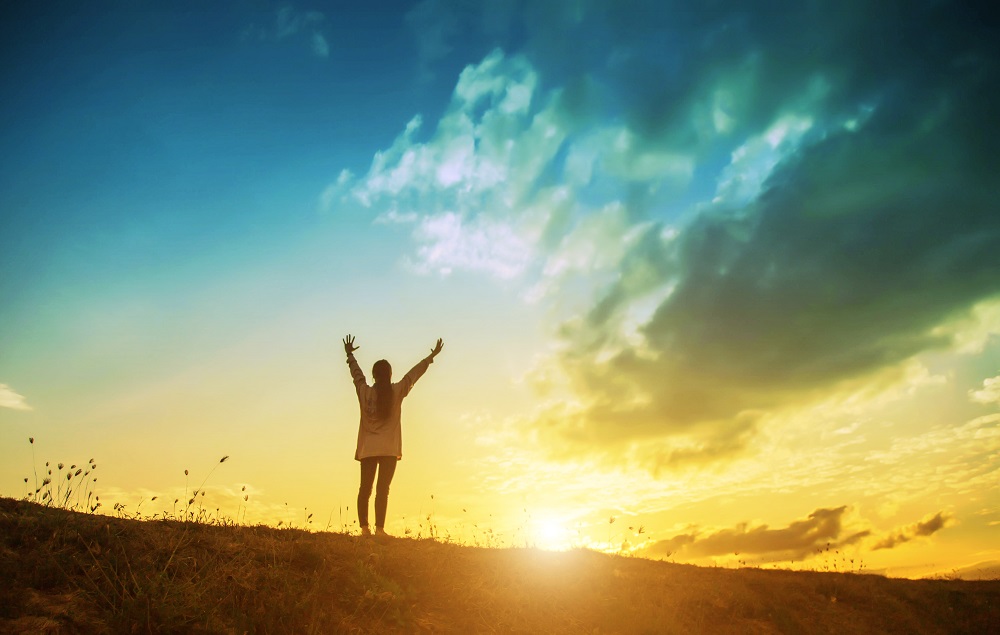 Silhouette,Of,Woman,Praying,Over,Beautiful,Sky,Background