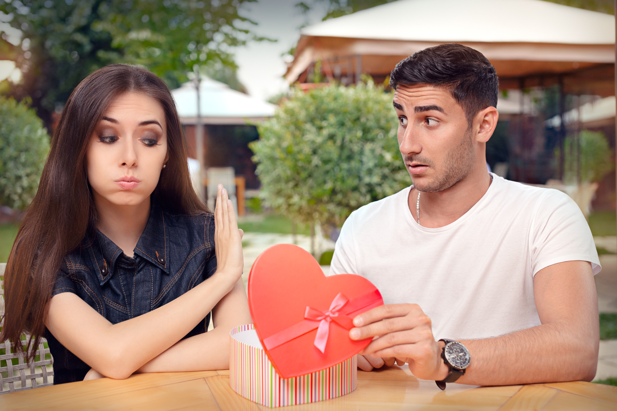 Girl Refusing Heart Shaped Gift From Her Boyfriend