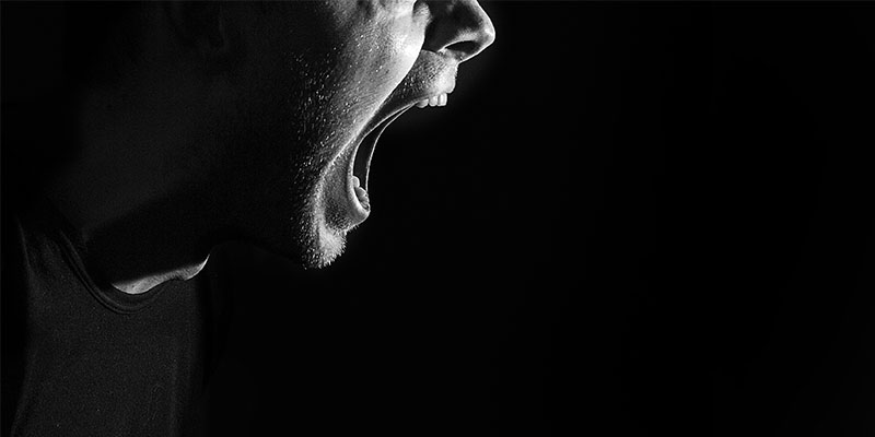 screaming angry aggressive militant guy, man, black and white portrait, evil face, teeth