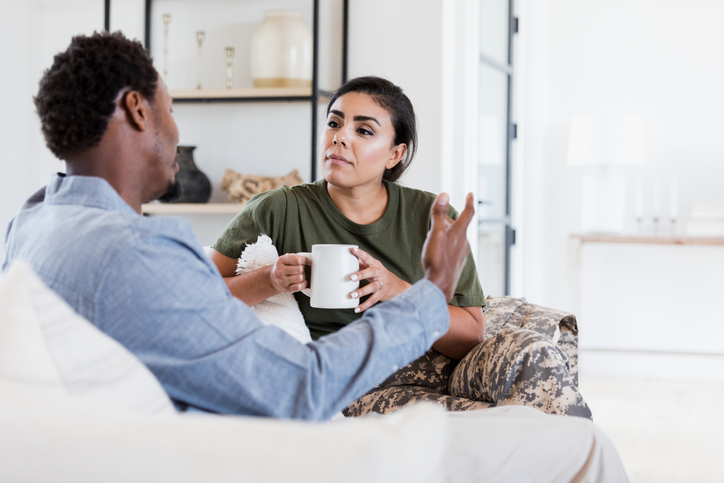 Husband and wife having serious conversation