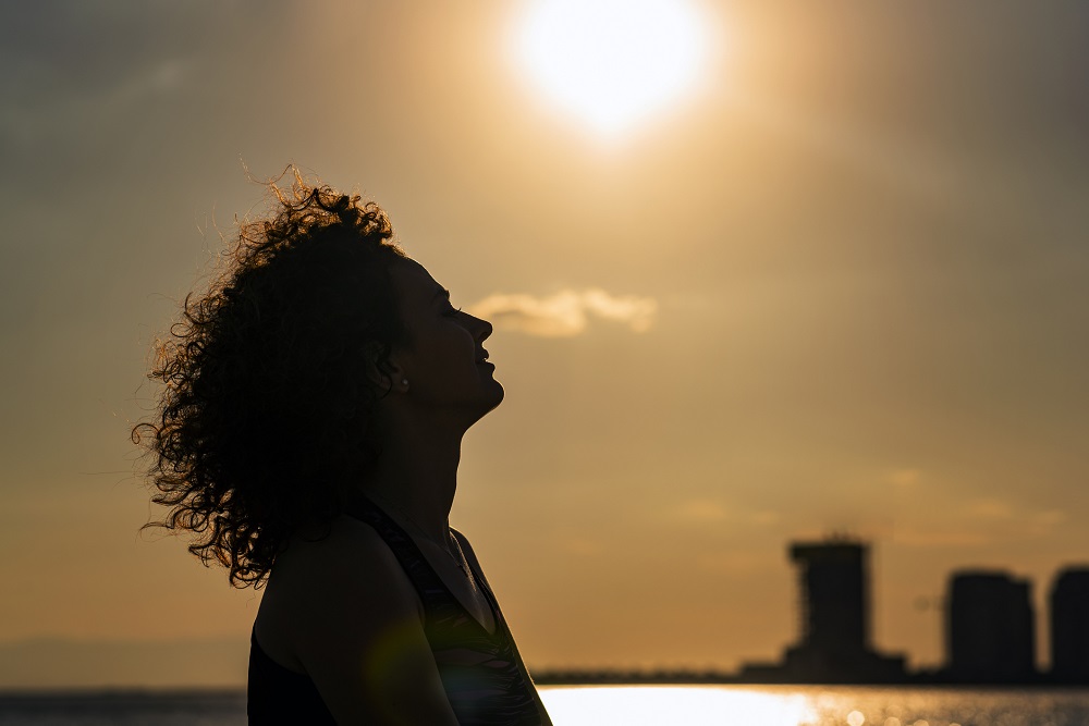 Silhouette of a happy woman