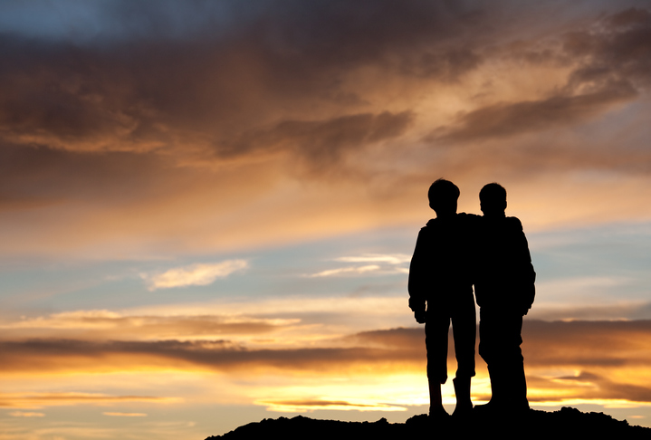 Happy Children Watching Sunset