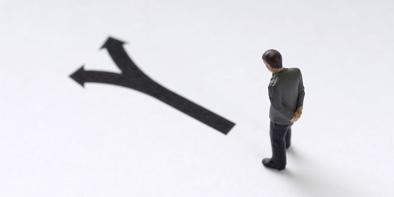 Man deciding which direction to take