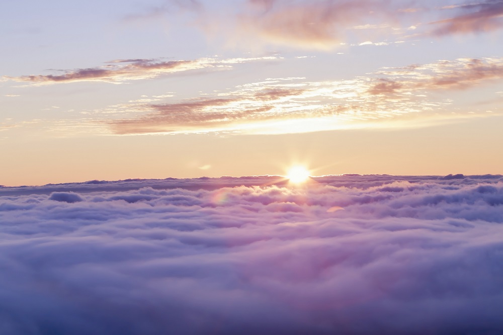 Divine sunset above the clouds