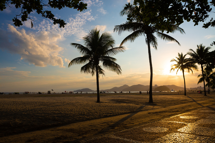 Sunset in the city of Santos, highlighting the boardwalk and the beach