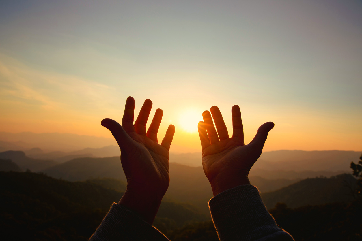 Human hands open palm up worship