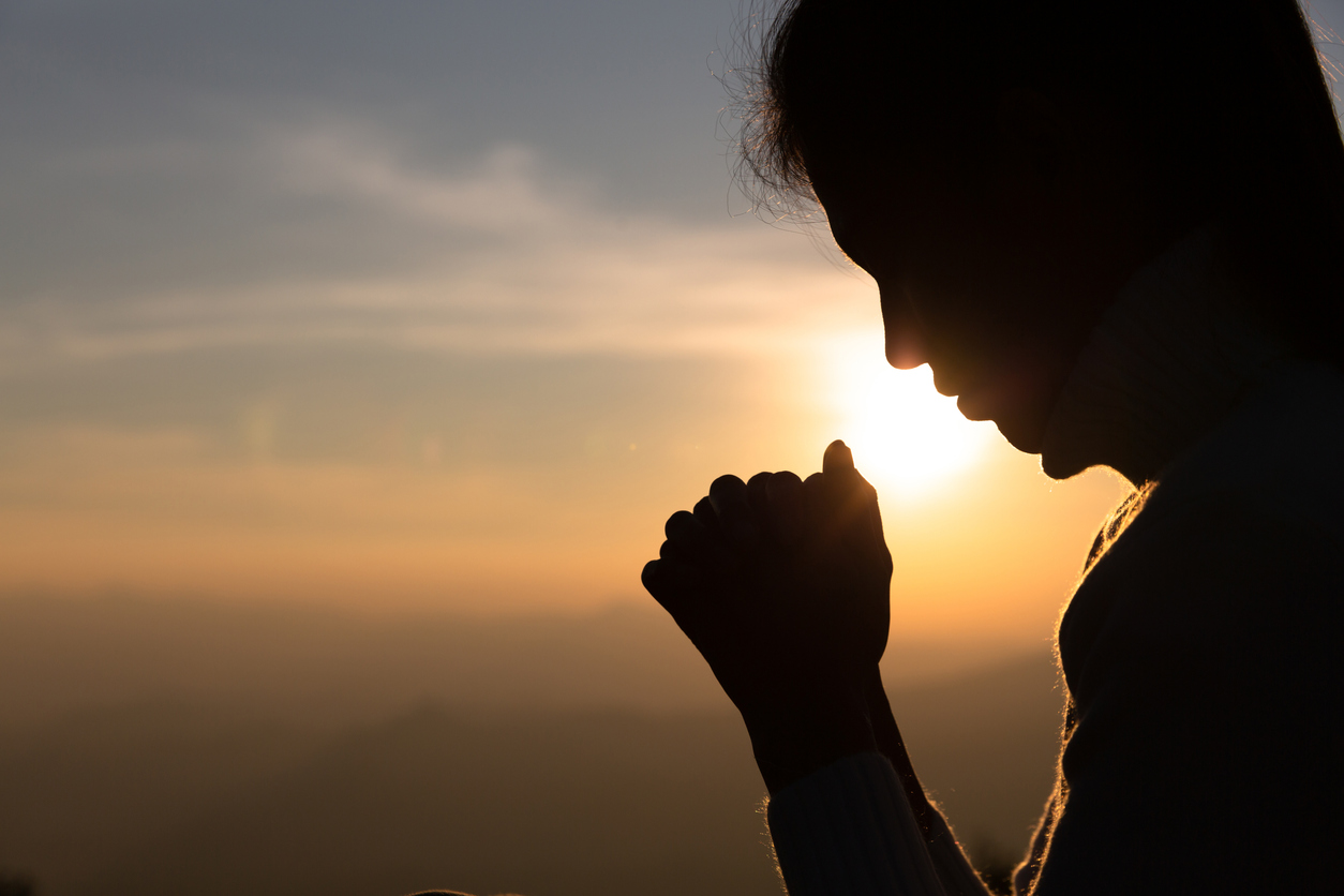 Woman Pray for god blessing to wishing have a better life. begging for forgiveness and believe in goodness. Christian life crisis prayer to god. Religious concepts.