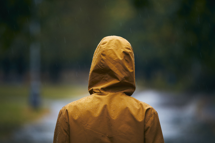 Man in waterproof jacket during rain