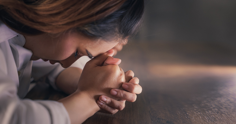 christianity background of saian woman praying for god blessing.