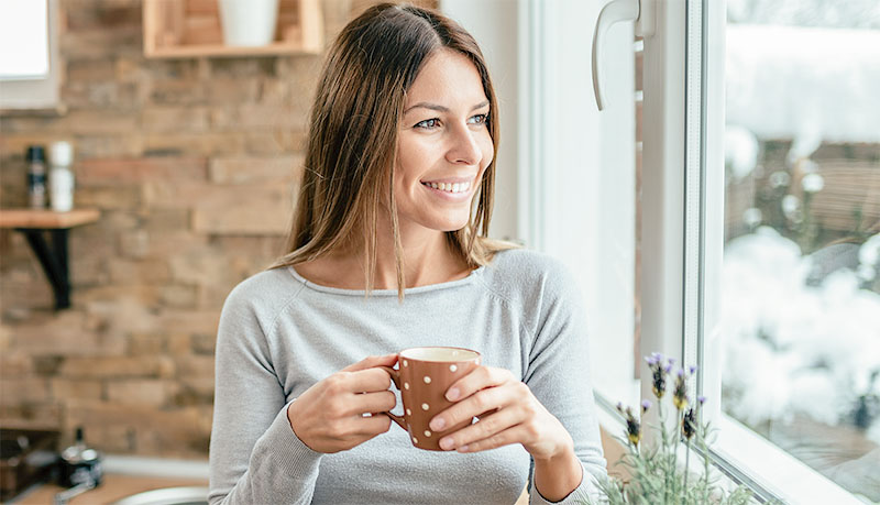 Enjoying morning coffee at home.