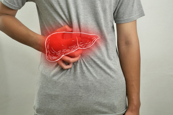 Digital composition of human liver with highlighted red inflammation on sick person, man with stomach pain