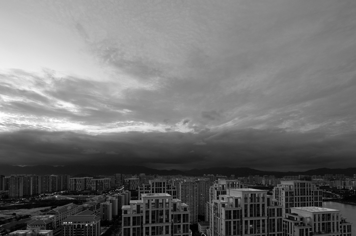 City covered with storm clouds