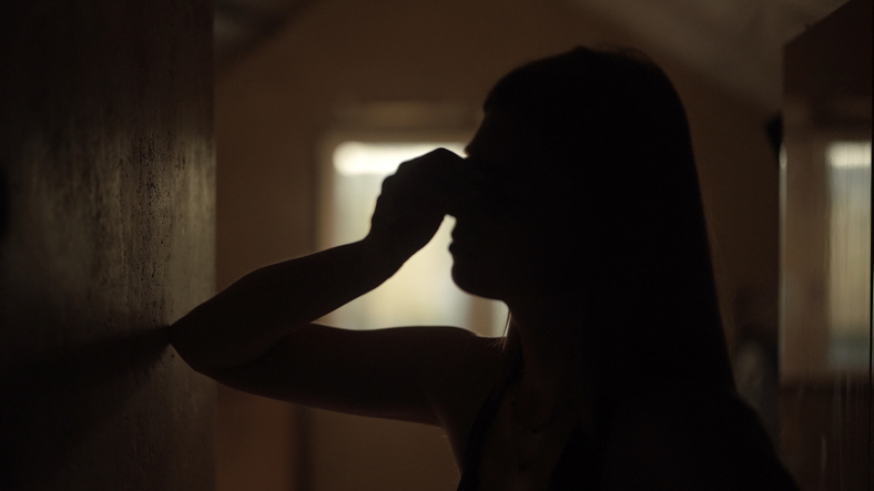 The girl sits in a dark room and suffers a mental breakdown &#8211; depression.