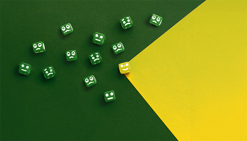 Area and bead with a happy expression that is differentiated by its color and mood