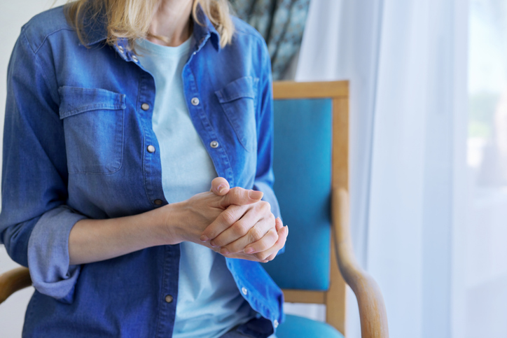 Close-up of praying woman’s hand. Faith, religion, prayer, meditation, spirituality, people